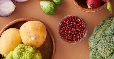 fresh vegetables on brown surface