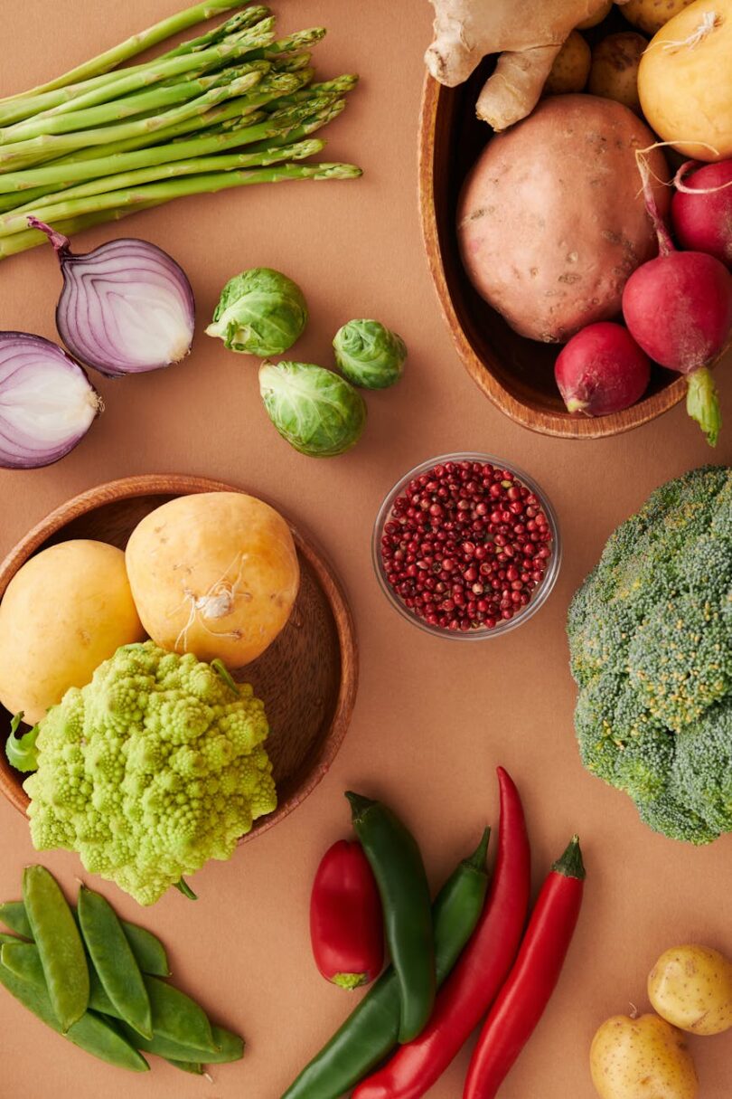 fresh vegetables on brown surface